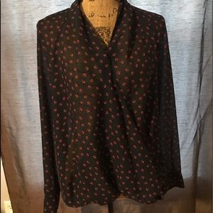 Sheer, blue blouse with red flowers